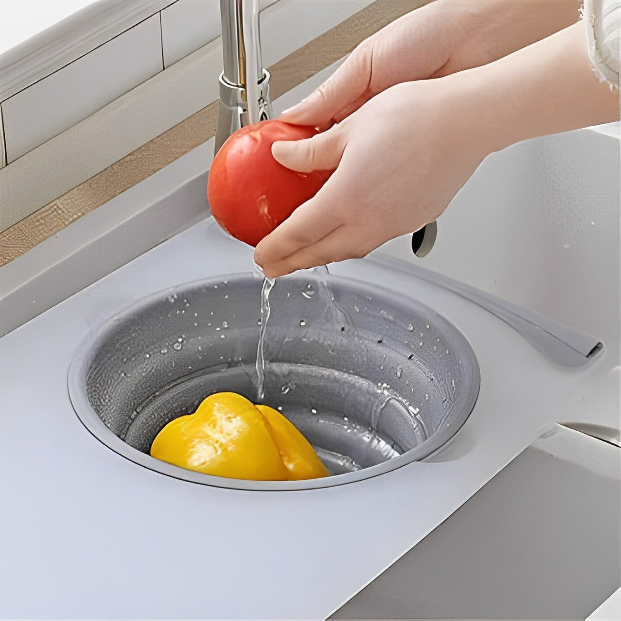 A Person is Cleaning Veggies Placed In a Basket Of Multifunctional Chopping Board.