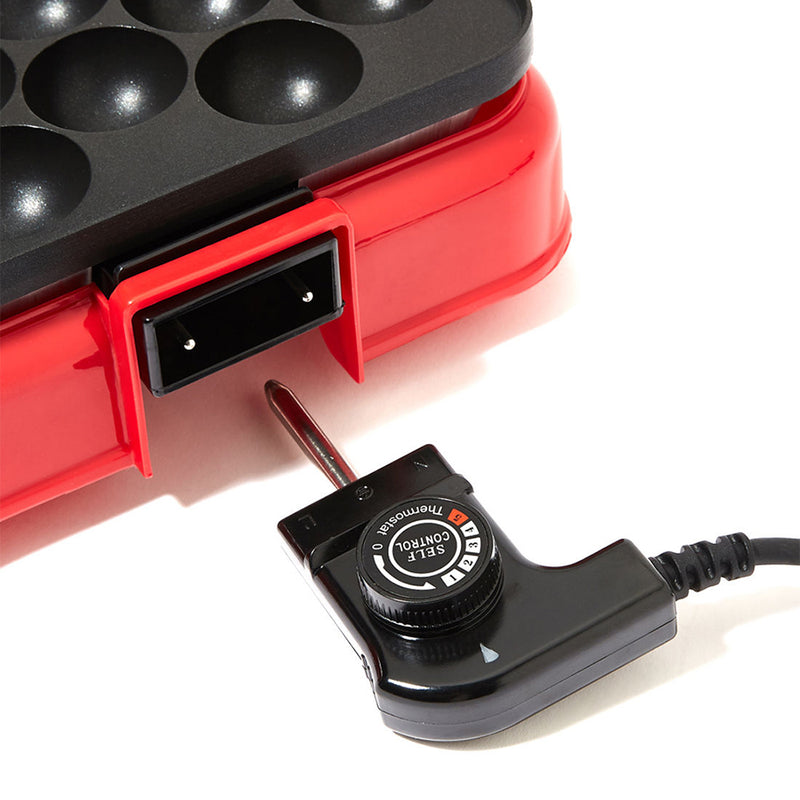 Saachi Octopus Dumpling Maker with adjustable thermostat control and non-stick cooking plate, ideal for making takoyaki, dumplings, and mini snacks at home.