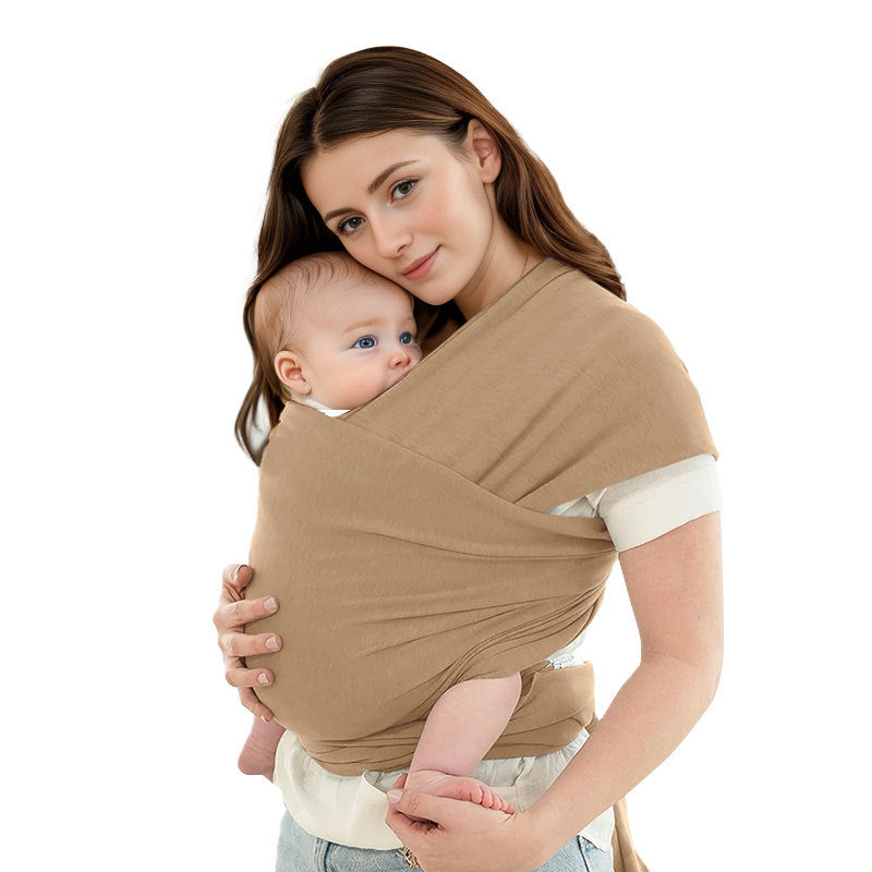 A Women is Holding Her Baby Using Newborn Baby Wrap Carrier Cloth in Brown Color.
