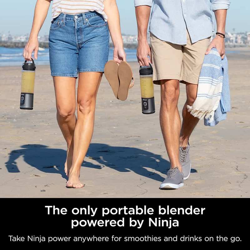 A Couple is Holding Ninja Blast Portable Blender.