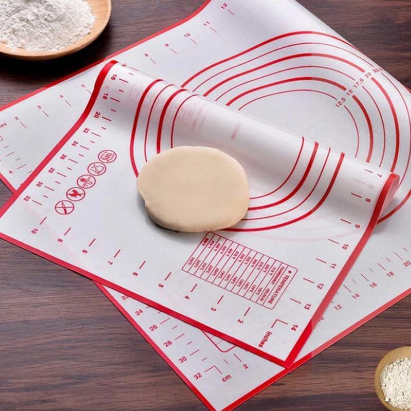 A Dough in a Non-Slip Baking Mat With Measurements