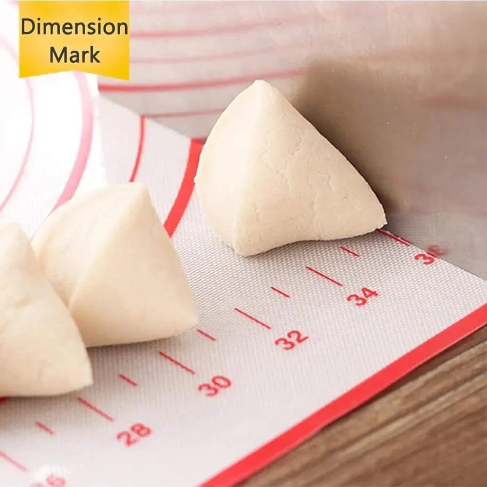 A Rolled Dough Placed in a Non-Slip Baking Mat With Measurements.