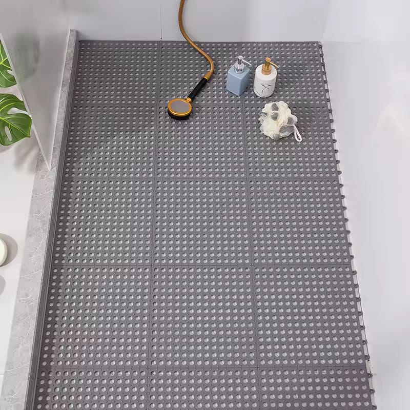 A Grey Non-Slip Bathroom Shower Mat is Placed at the Floor Of Shower Room.