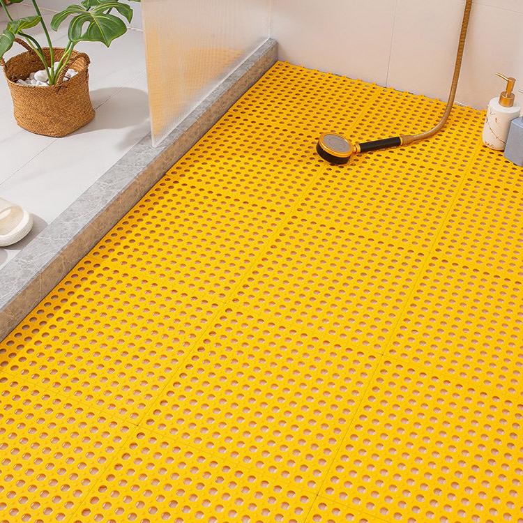 A Non-Slip Bathroom Shower Mat is Placed at the Floor Of Shower Room.