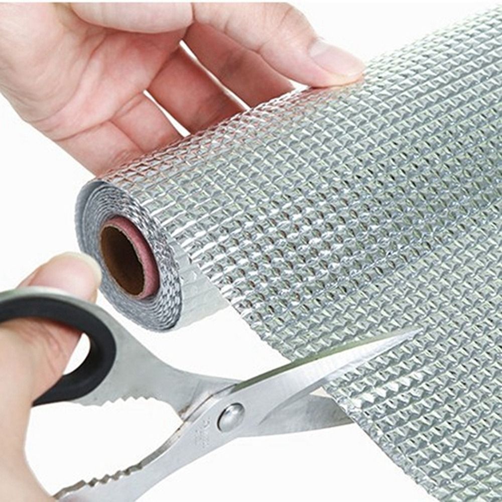 A Person is Cutting Non- Slip Kitchen Sheet.