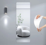  person testing the durability of HD Self-Adhesive Acrylic Mirror Tiles - Soft mirrors