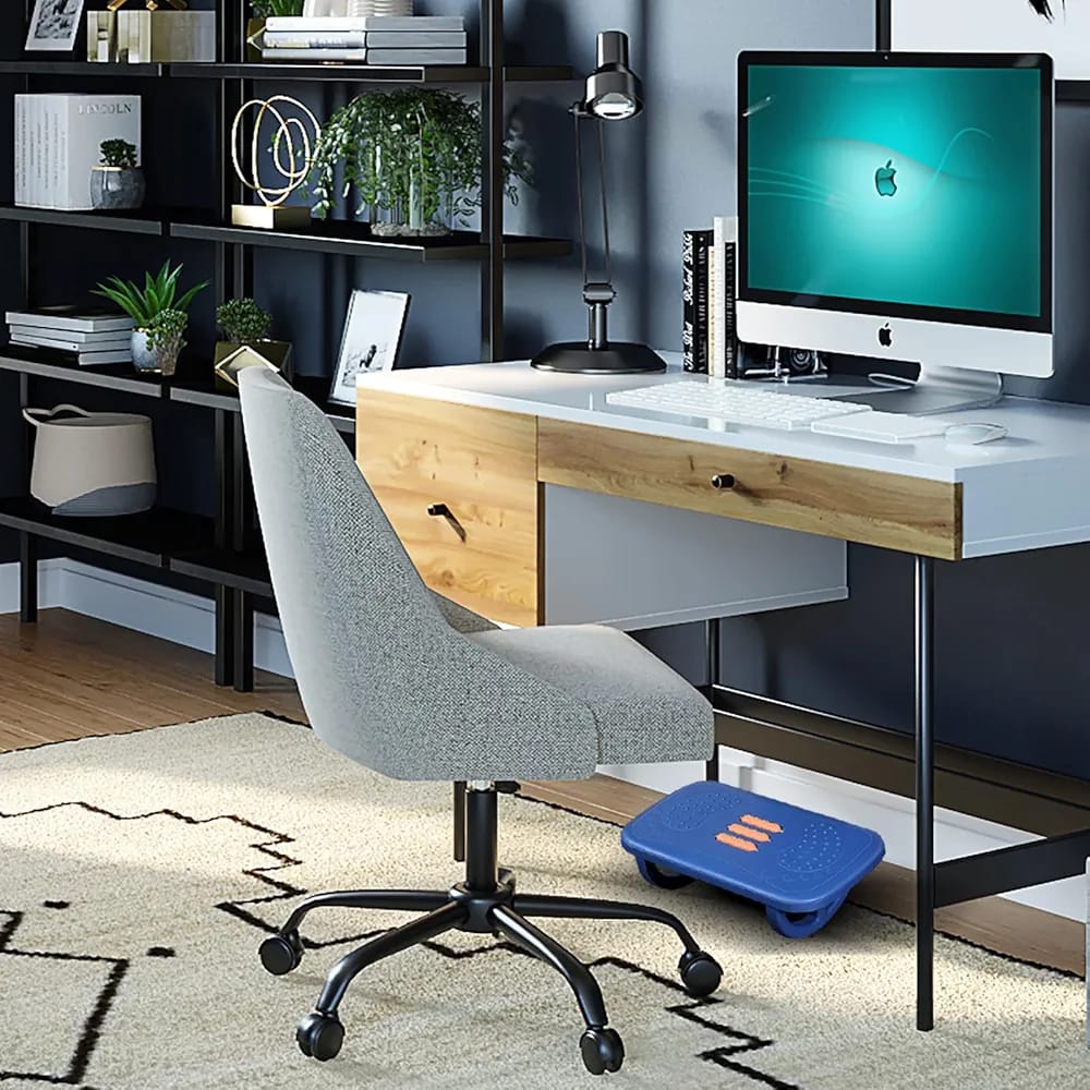  Foot Massager Stool Placed Under Desk At Office.