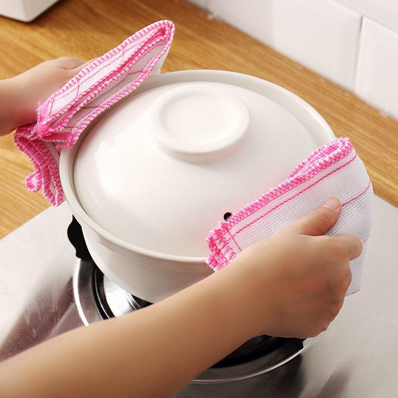 Someone is taking pots with the help of  Kitchen Dishwashing Cloths