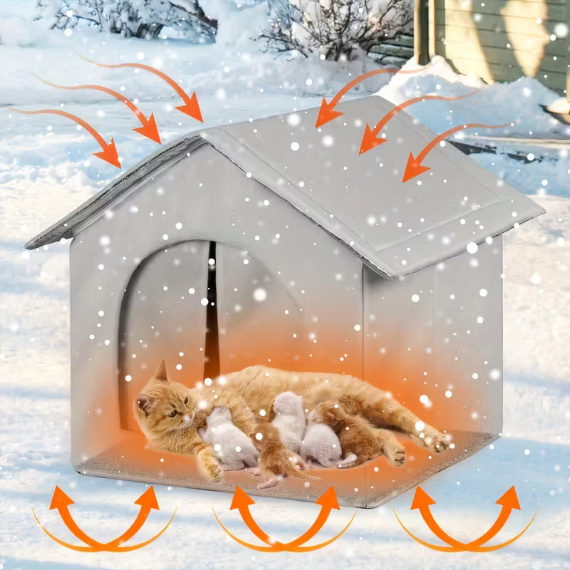 Cat and kittens inside a heated pet house in the snow with heating arrows indicating warmth.