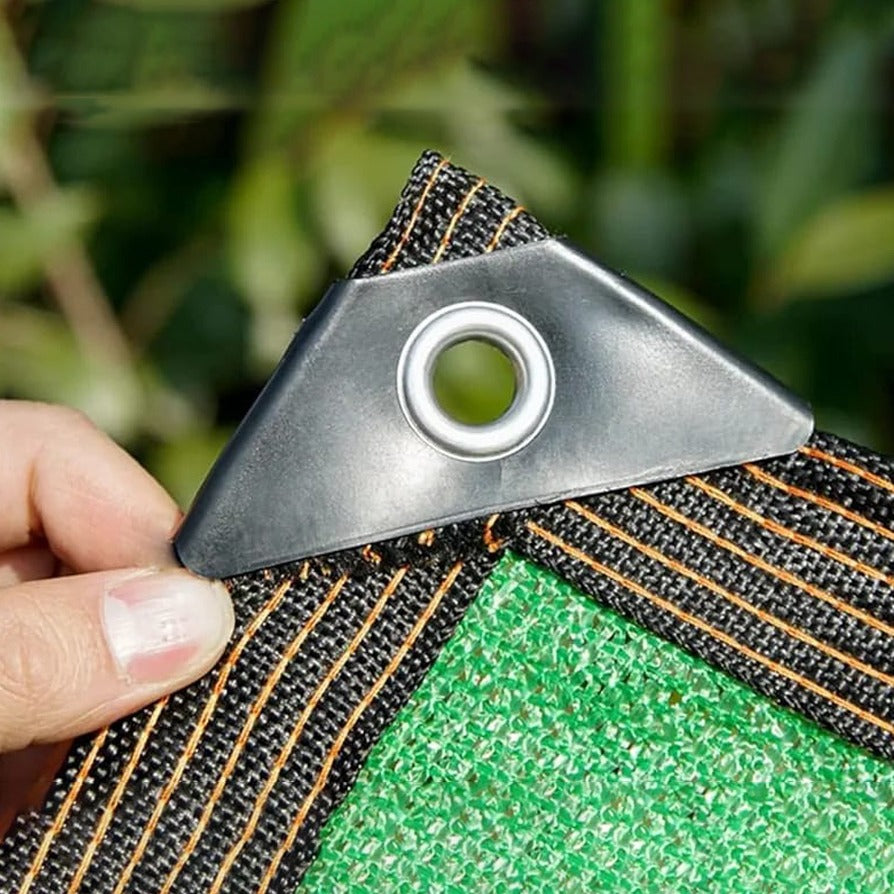 A Person is Holding Edge Portion Of Outdoor Shade Net.