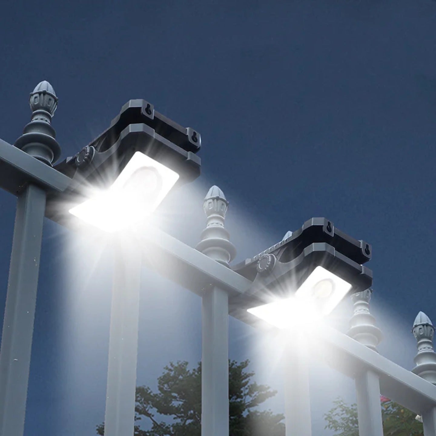 Outdoor solar clip lamp attached to metal fence