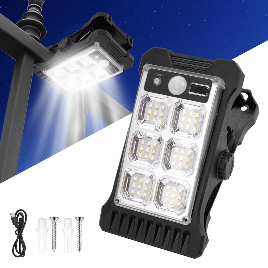 Outdoor solar clip lamp attached to metal fence.