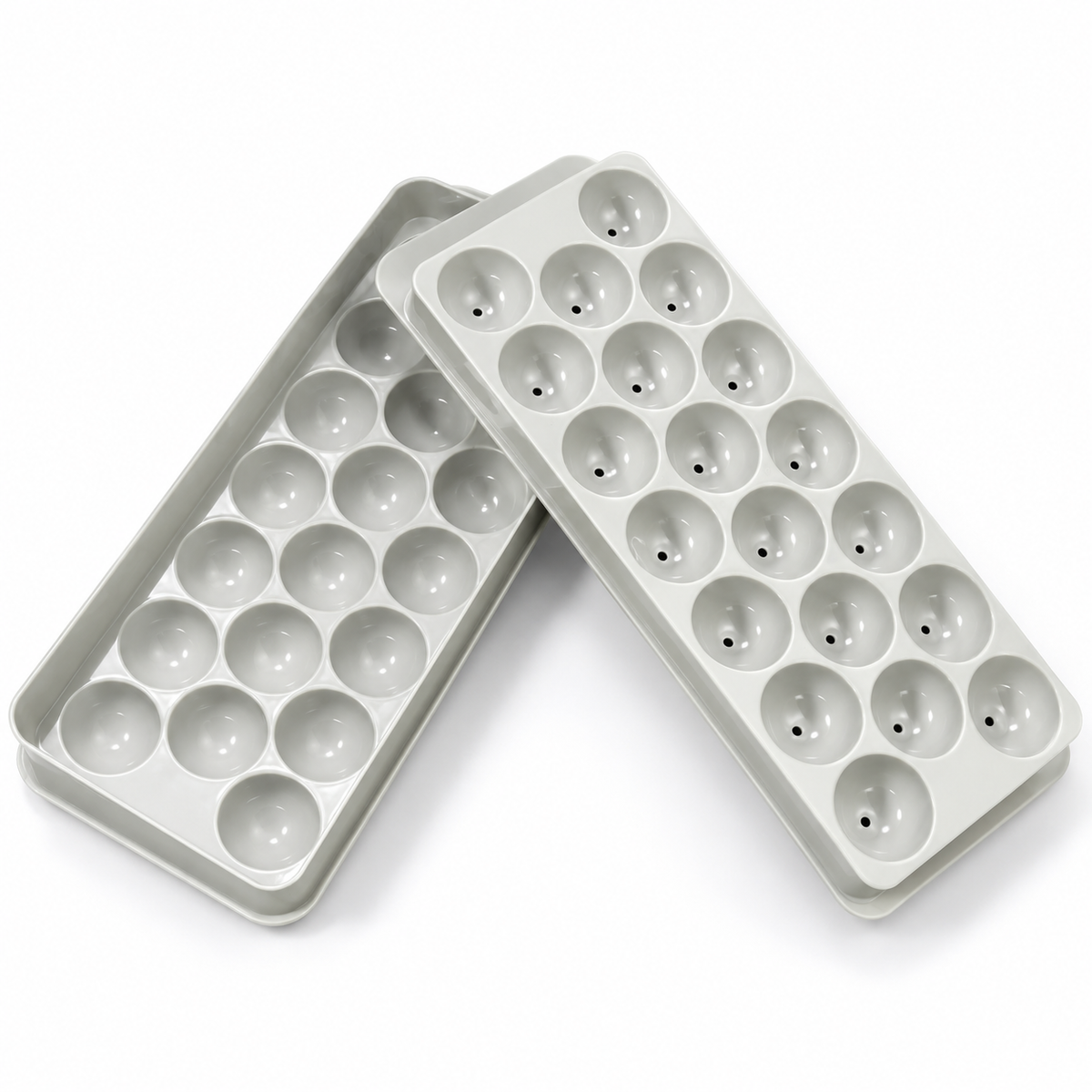Two light gray silicone mold trays with round cup-like cavities, shown overlapping on a clean white background.