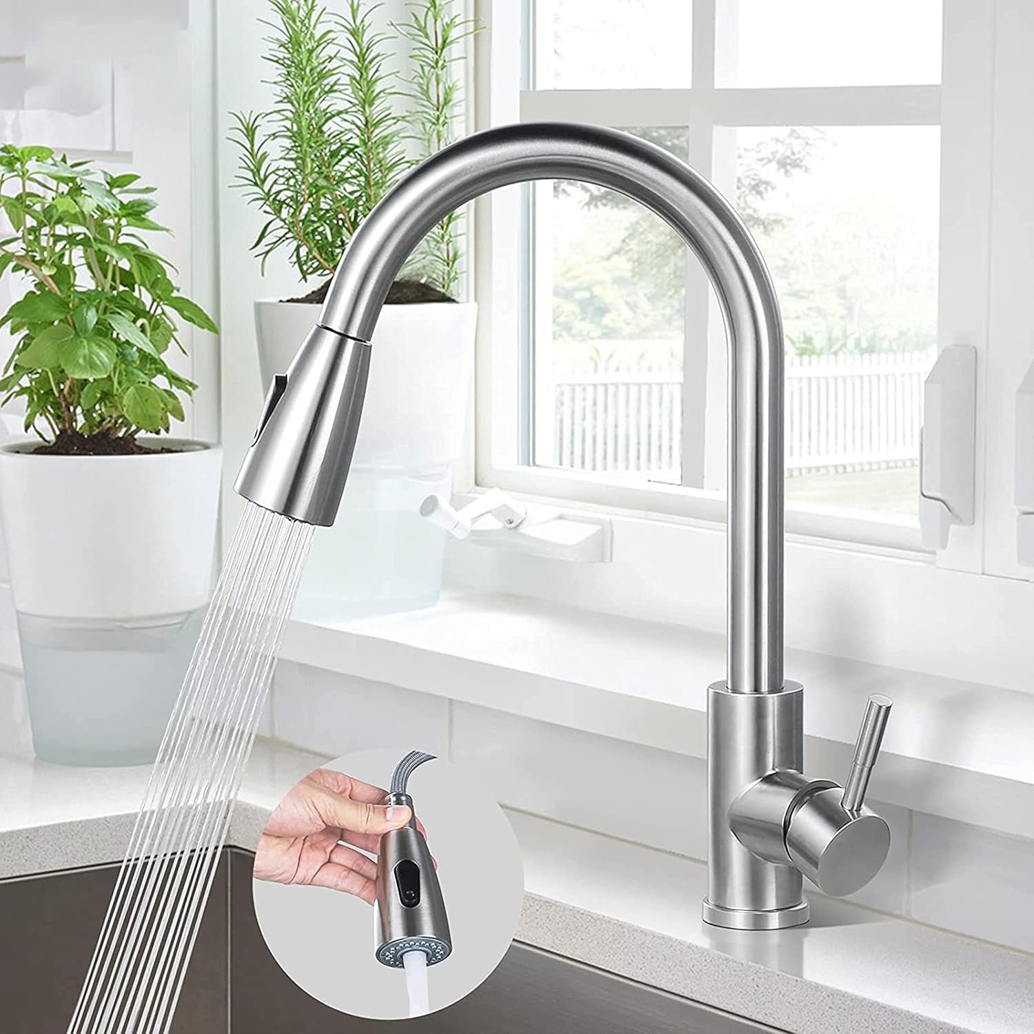 A Person is Holding a Kitchen Pull Out Tap.