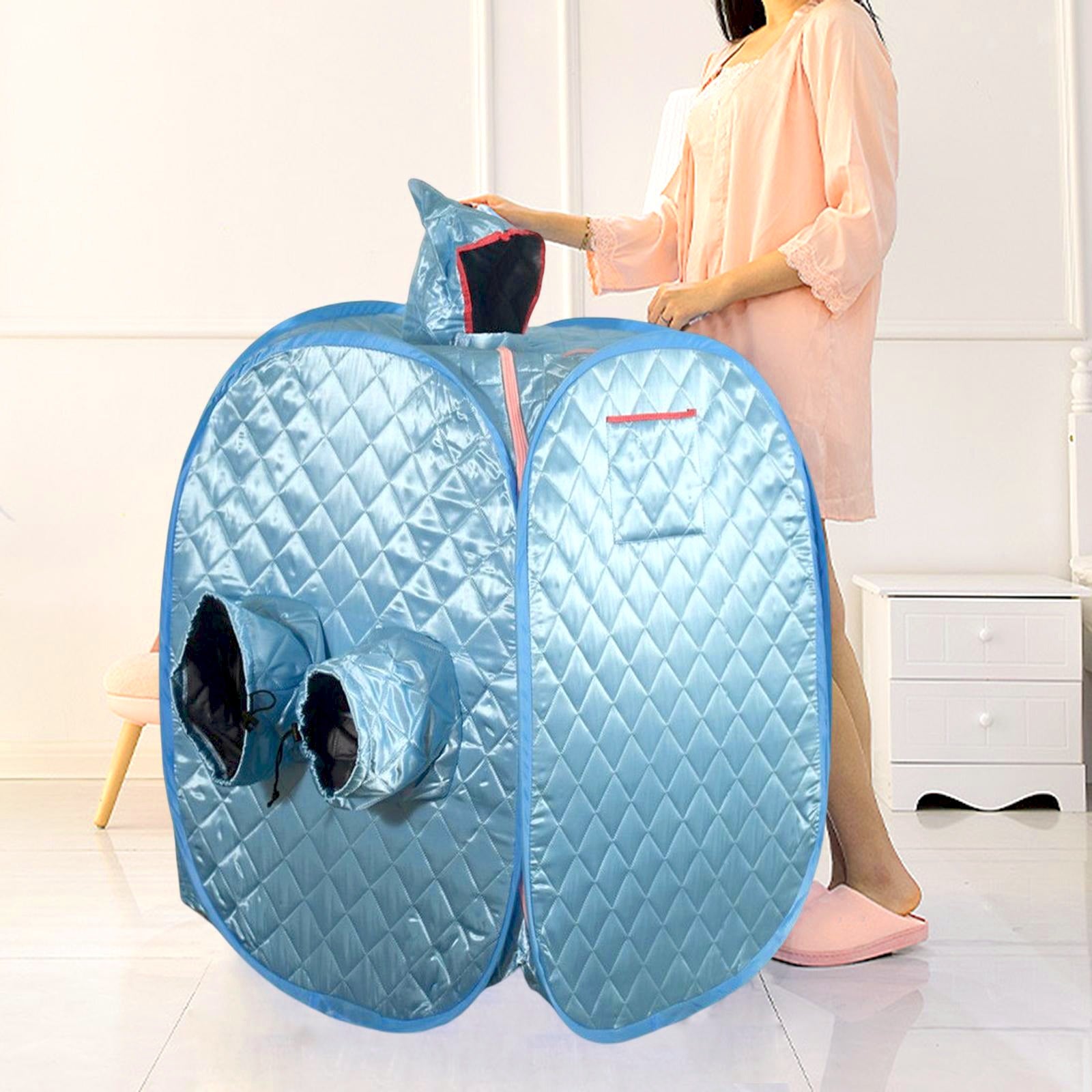 A Woman is Standing Near Personal Sauna Room Tent.