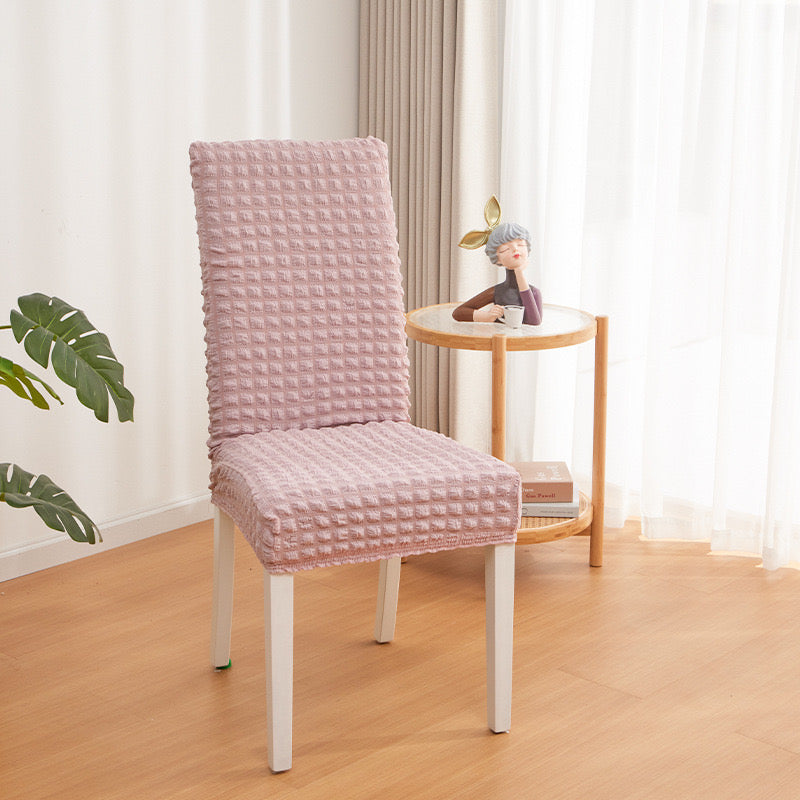 A Chair is Covered With Pink Bubble Stuff Stretchable Chair Cover 