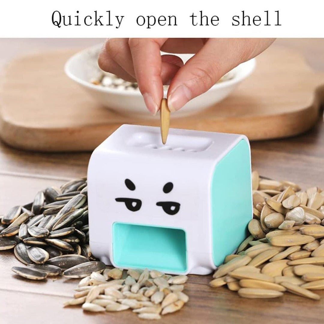 A Person is Placing Seed in to Electric Seed Peeler