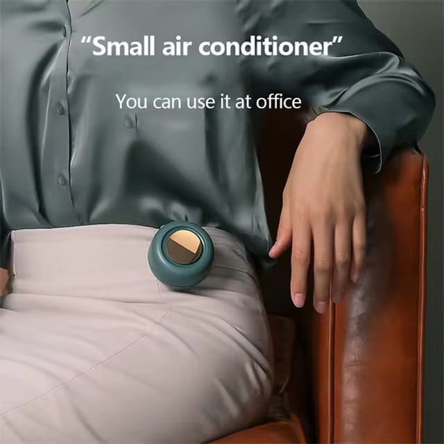 A Woman is Attached Pocket Clip Fan on her Waist Area.