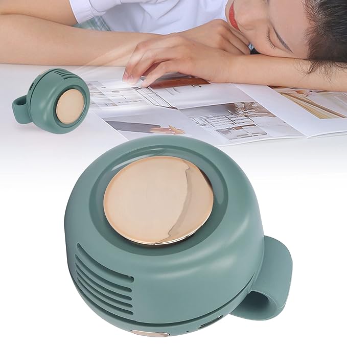 A Woman is Sleeping by Placing Pocket Clip Fan Nearby.