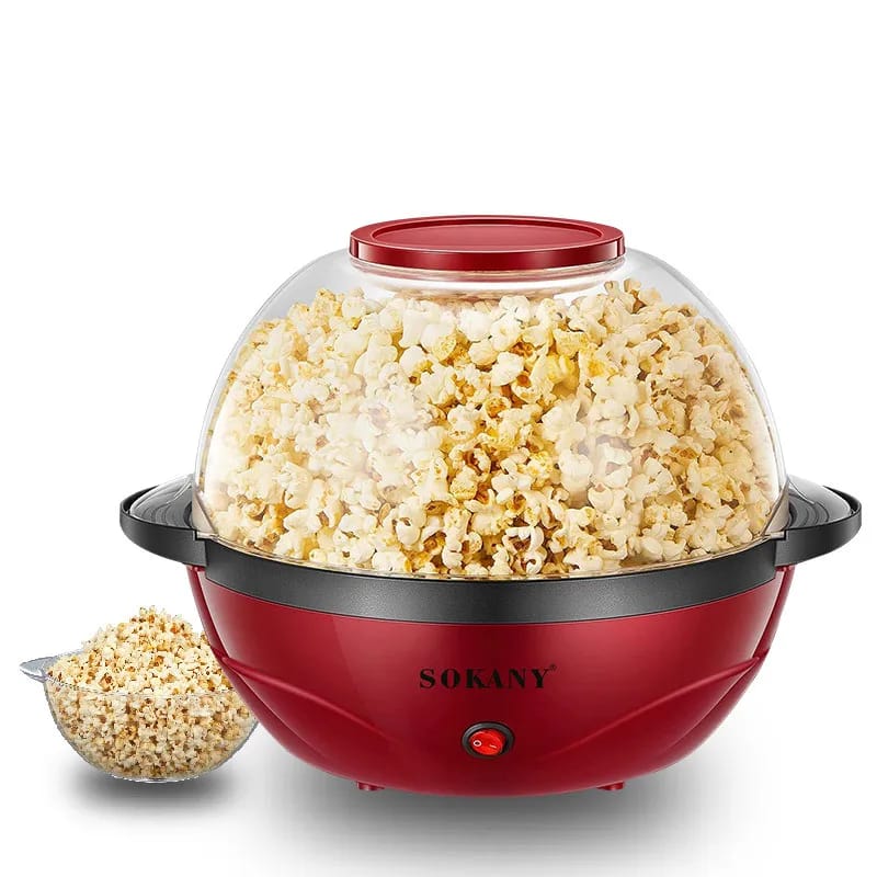 Electric Popcorn Maker With Popcorn in it. 