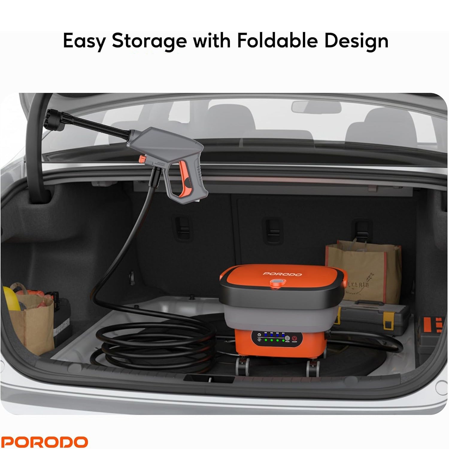 Porodo AquaSpray Multifunctional Pressure Washer is stored in a car dick.