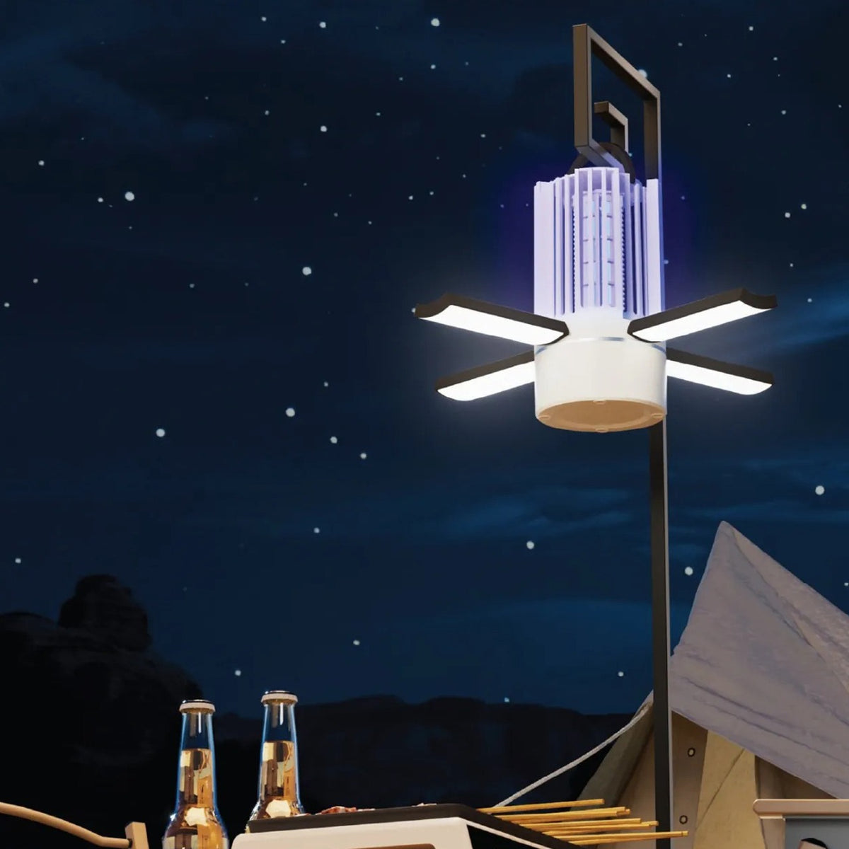 A Porodo Portable 2-in-1 Insect Killer Lamp with foldable LED lights hanging outdoors at night, ideal for camping and outdoor use, with foldable LED lights hanging outdoors at night, ideal for camping and outdoor use.