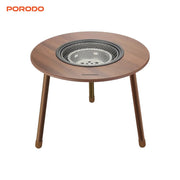 Wooden table with a grill on a white background, branded 'PORODO'.