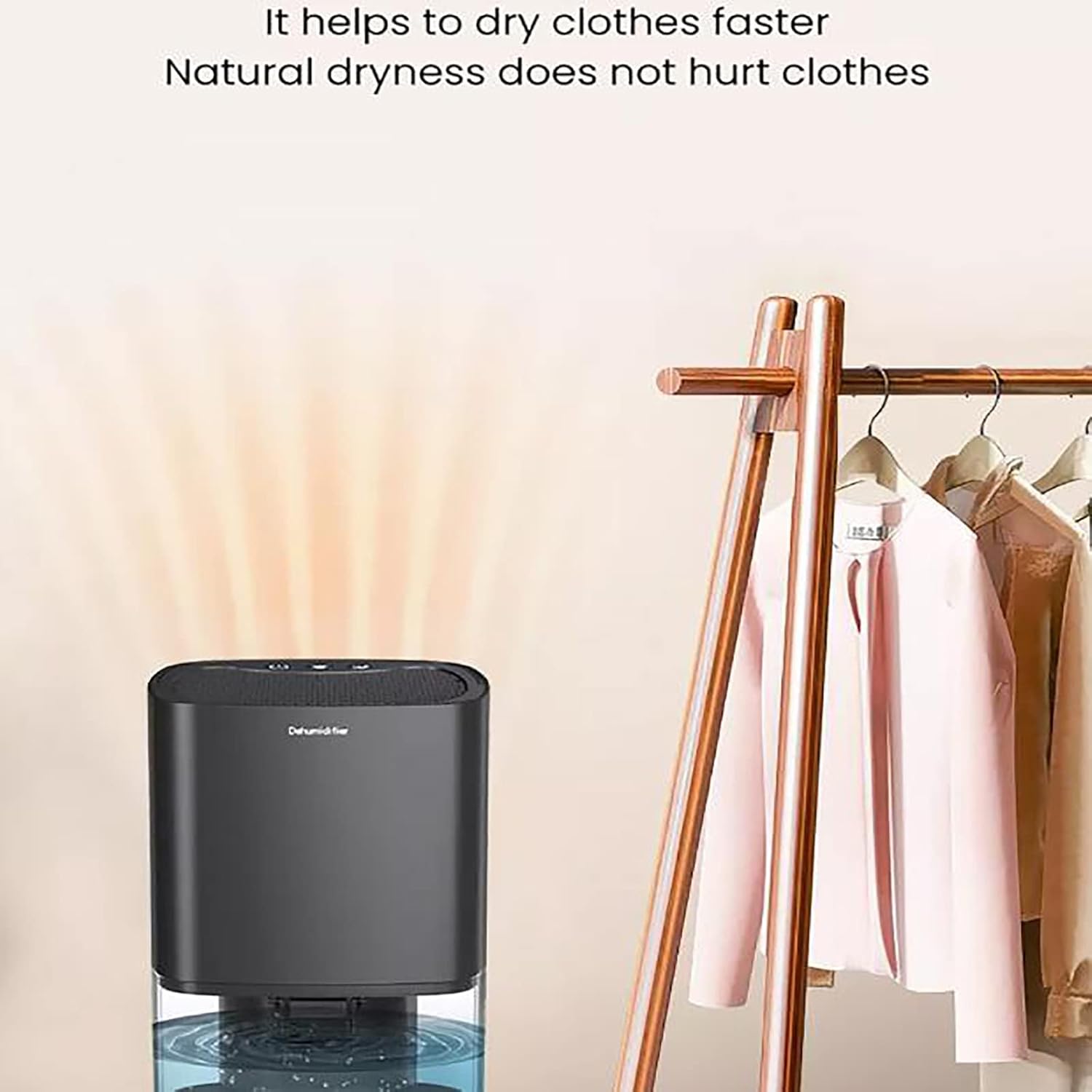 A  Portable Air Dehumidifier Is Placed Near Cloths.