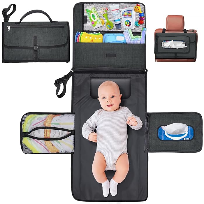 A Baby is Lying On the Portable Diaper Changing Travel Mat Bag Organized with Baby Essentials.