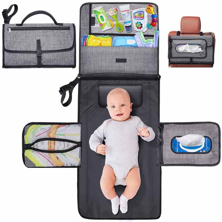 A Baby is Lying On the Portable Diaper Changing Travel Mat Bag Organized with Baby Essentials.