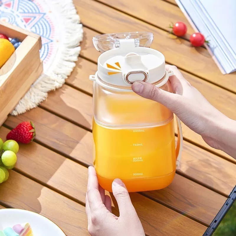 A Person is Opening Portable Electric Juicer Blender Cup.