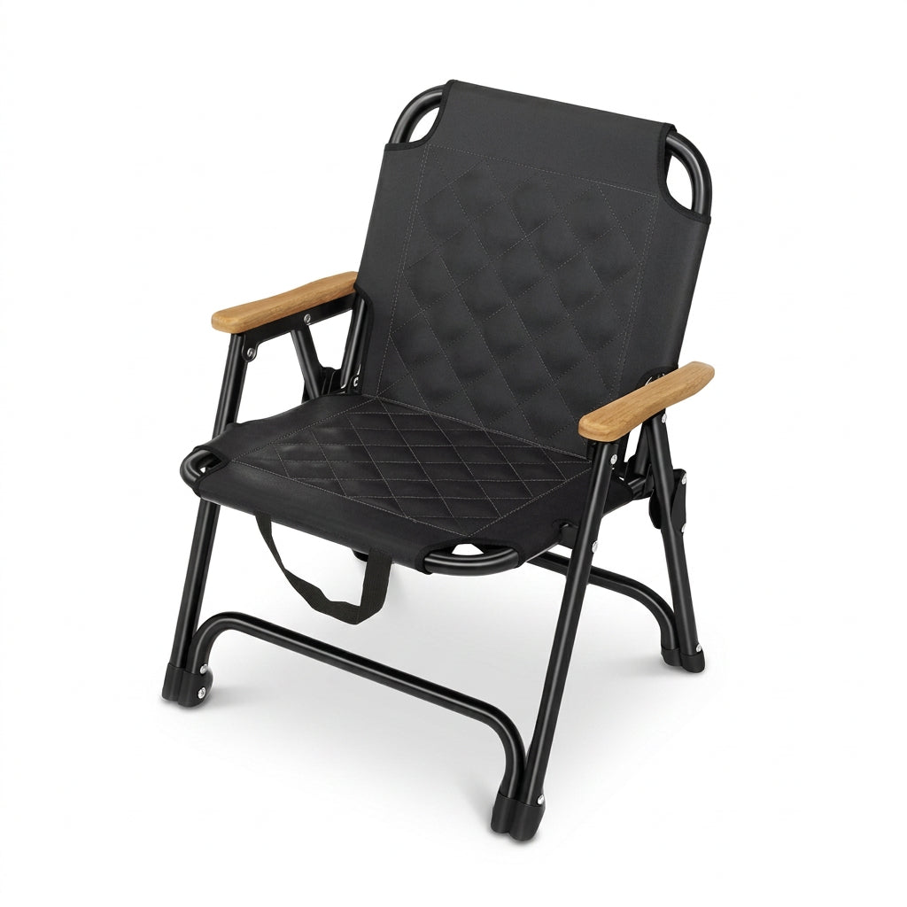 A black camping folding chair with a quilted fabric seat and backrest, featuring light brown wooden armrests and a black metal frame, shown on a plain white background.