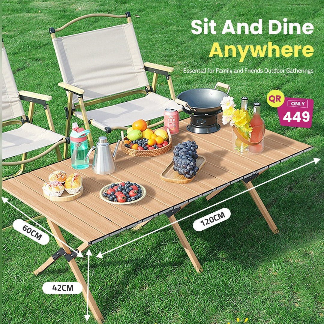 Portable Folding Chair and Table Set Having Drinks and Fruits On it.