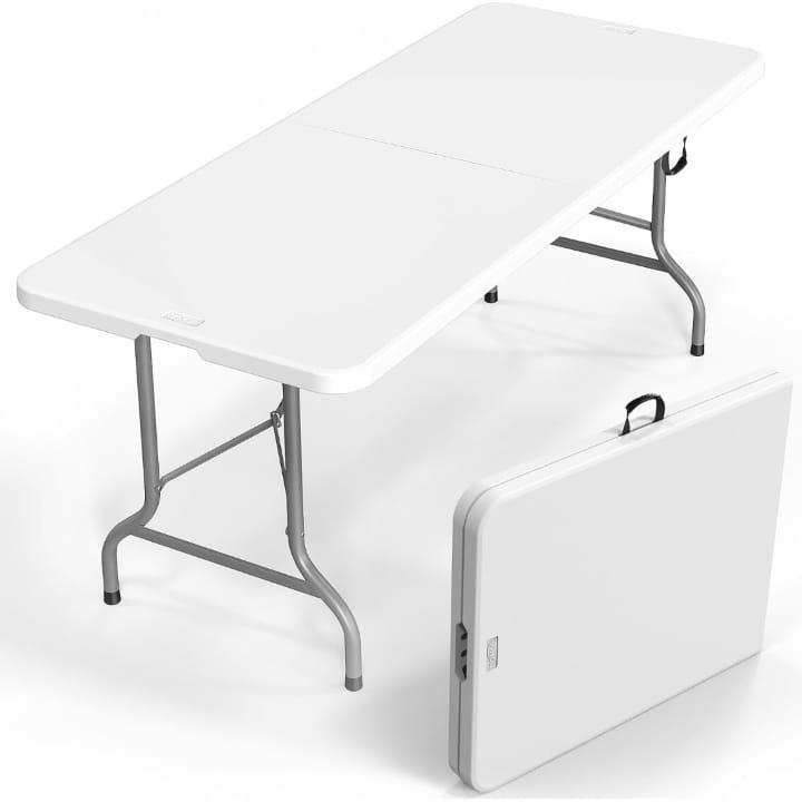 Portable Folding Indoor Outdoor Table in White Color.