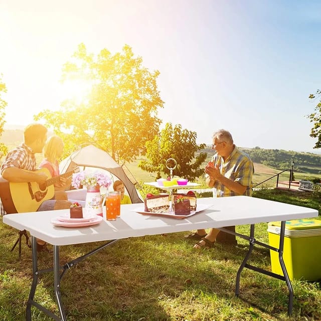 A Family Takes Portable Folding Indoor Outdoor Table For Their Outing.