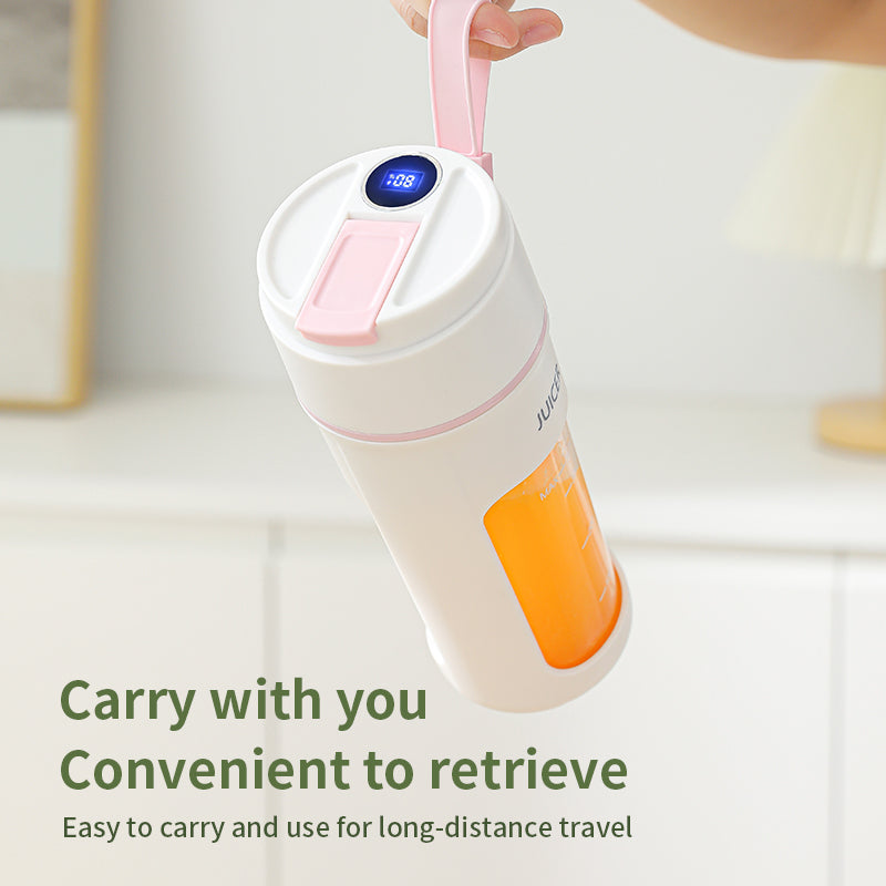 A Person is Holding Portable Juicer Filled with Juice.