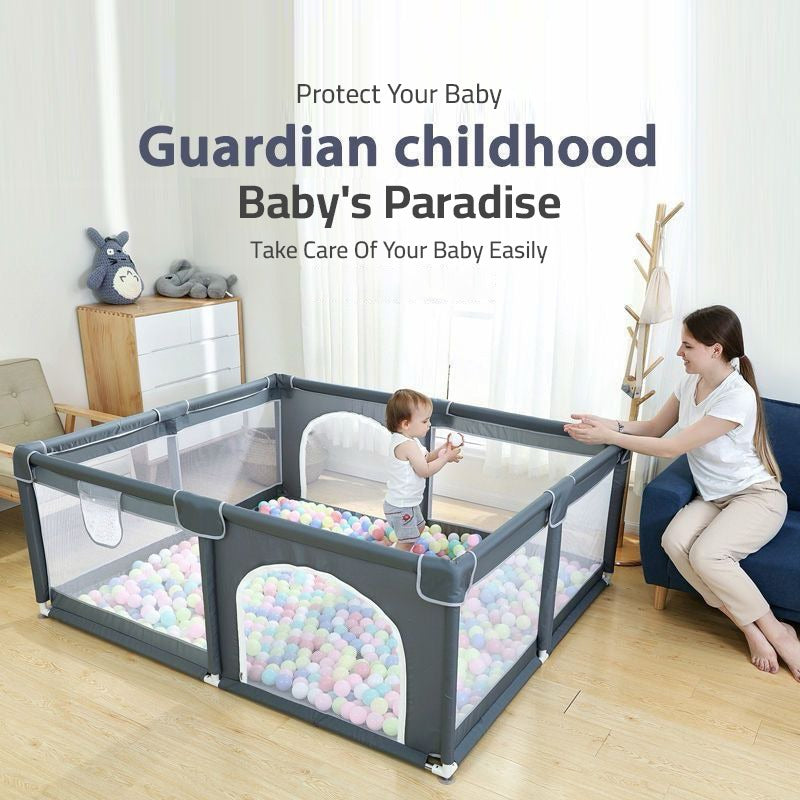 A Baby is Playing Inside a Portable Large Baby Fence Area.