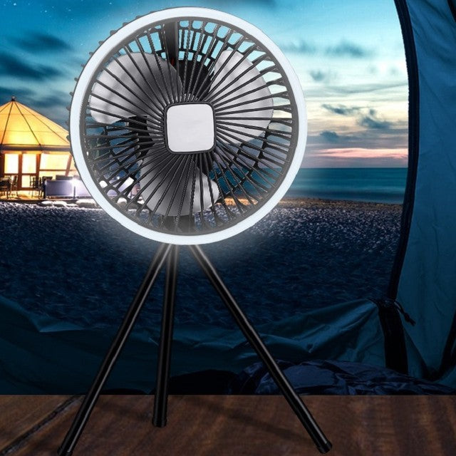 Portable Mini Fan in Grey Color Placed in a Tent.