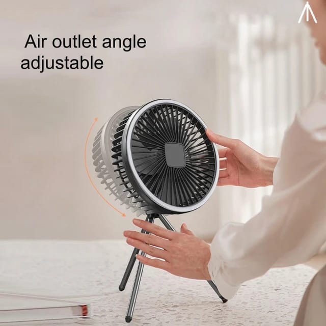 A Person is Adjusting Portable Mini Fan.