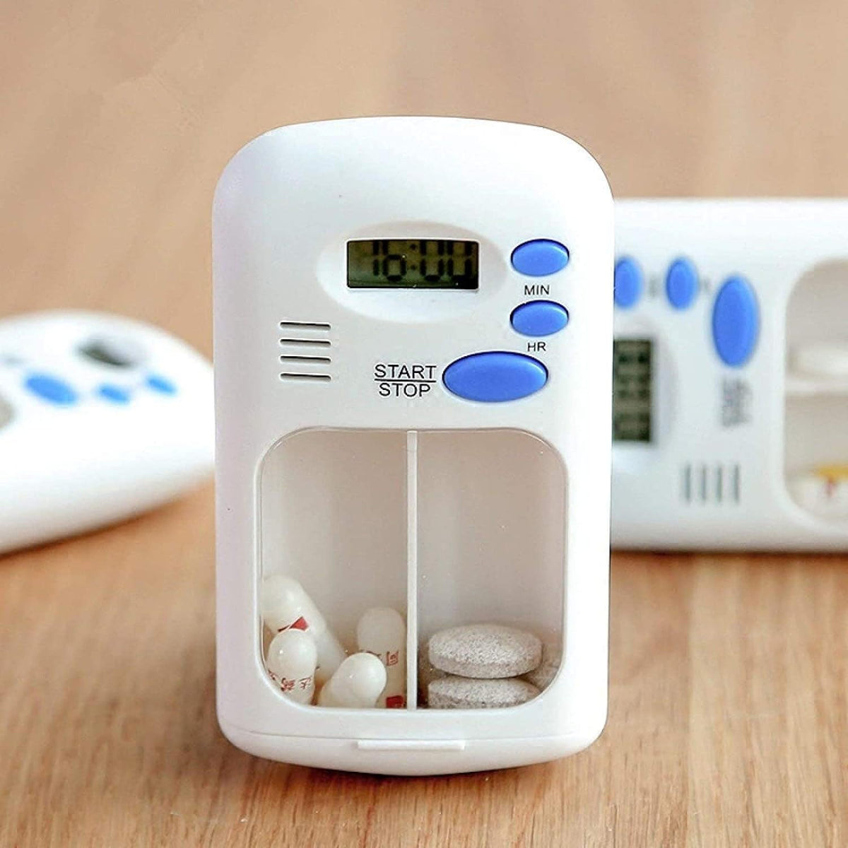 The Portable Mini Travel Carry Pill Box is placed on the table