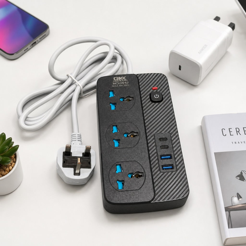Power Socket Extension is Placed  Along with some electronic Accessories.
