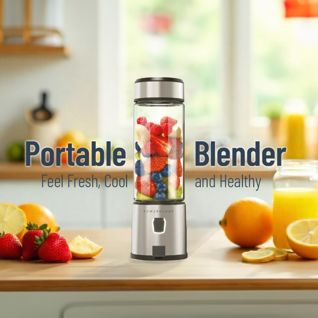 Powerology 6-Blade Portable Juicer with fruits on a kitchen counter, surrounded by lemons and a glass of juice.