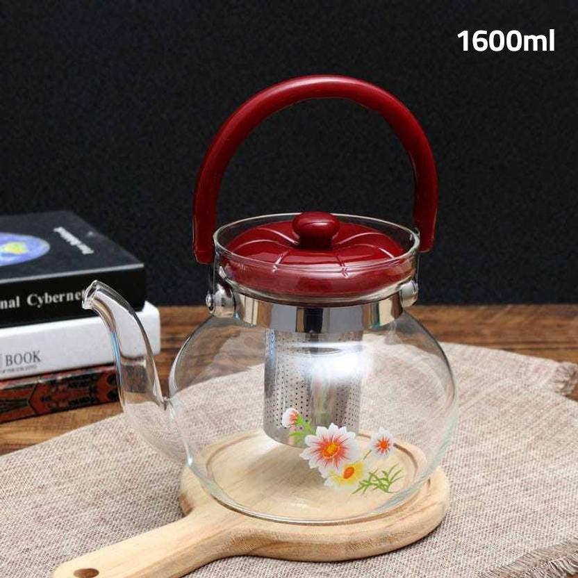 A Glass Tea Jug & Coffee Pot with Tea.