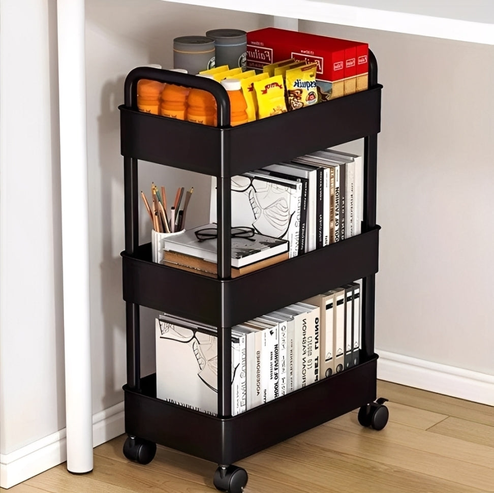 A 3-tier Trolley Cart is Organized with Books and other Essentials.