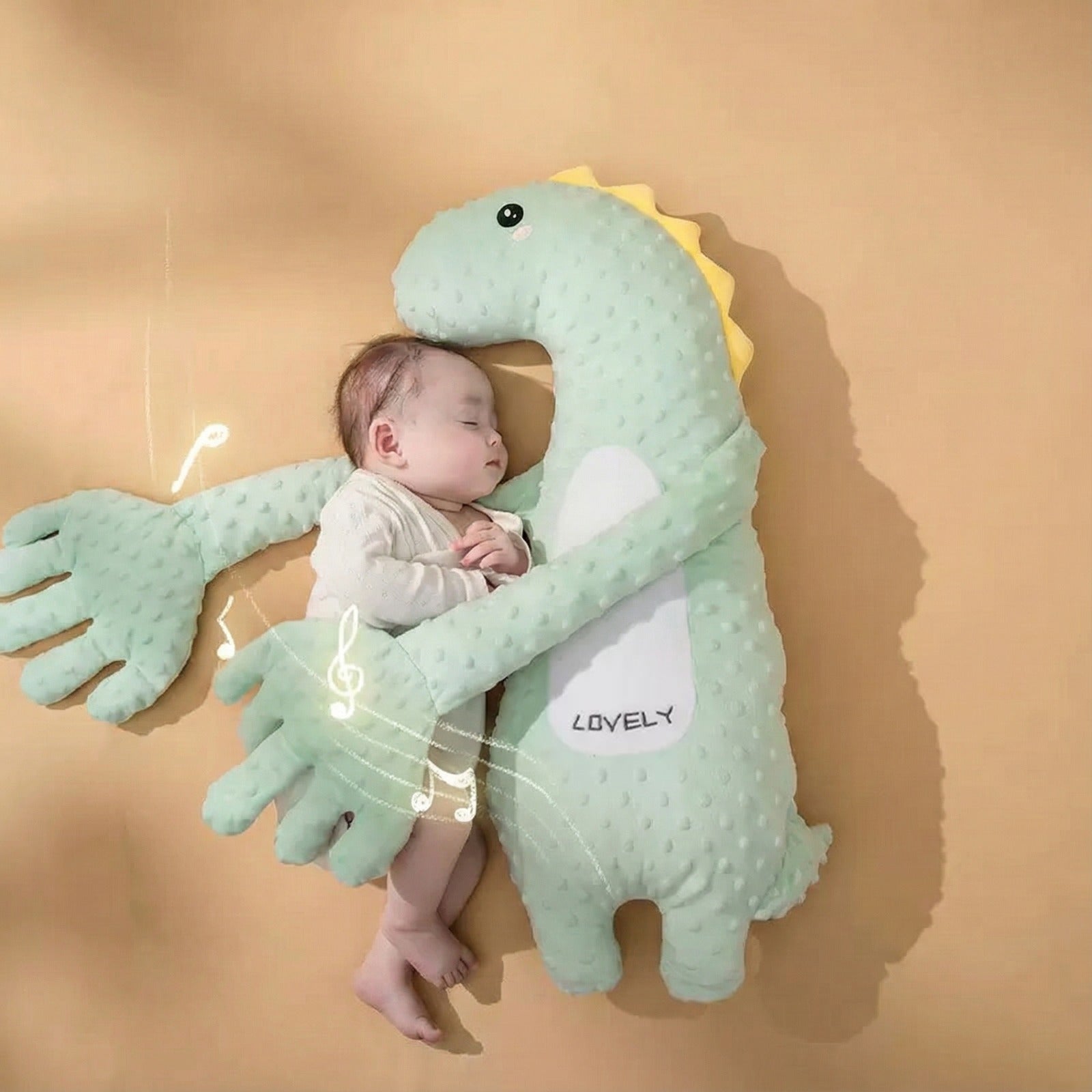 Baby sleeping comfortably in a Baby Patter cushion that cuddles and soothes with gentle arms.