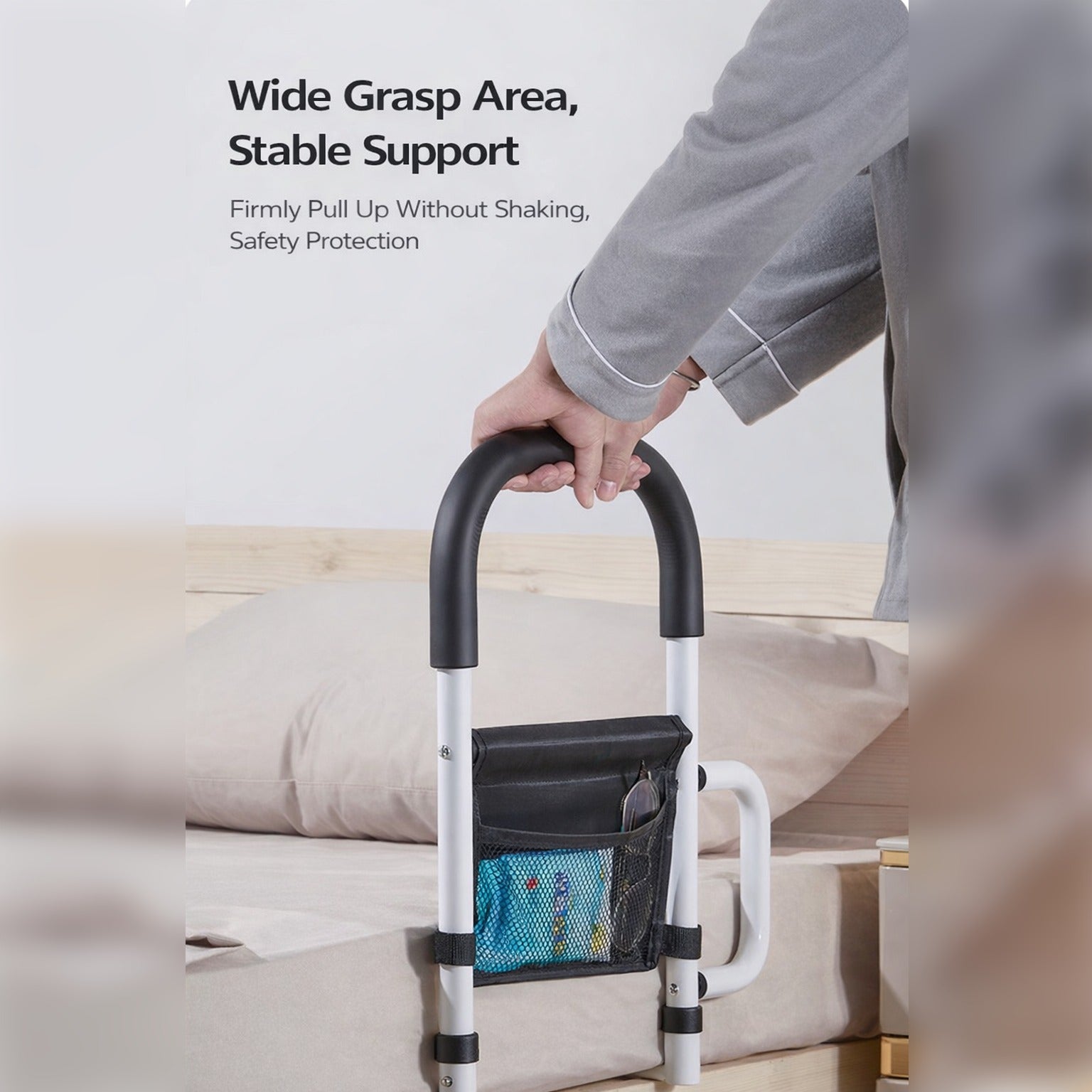 A Person is Standing with the aid of Bed Assist Rail with Safety Handle.