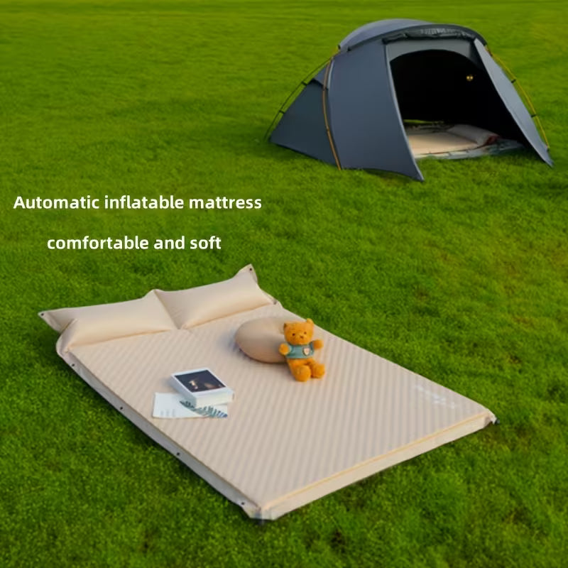 A  Self-Inflating Camping Mattress is arranged in a camping area.