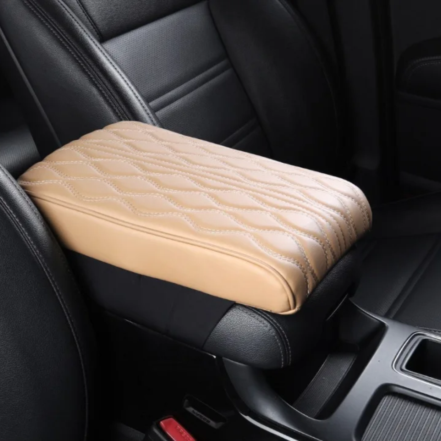 A Car Armrest Cushion is Placed on a Center Console of a Car.