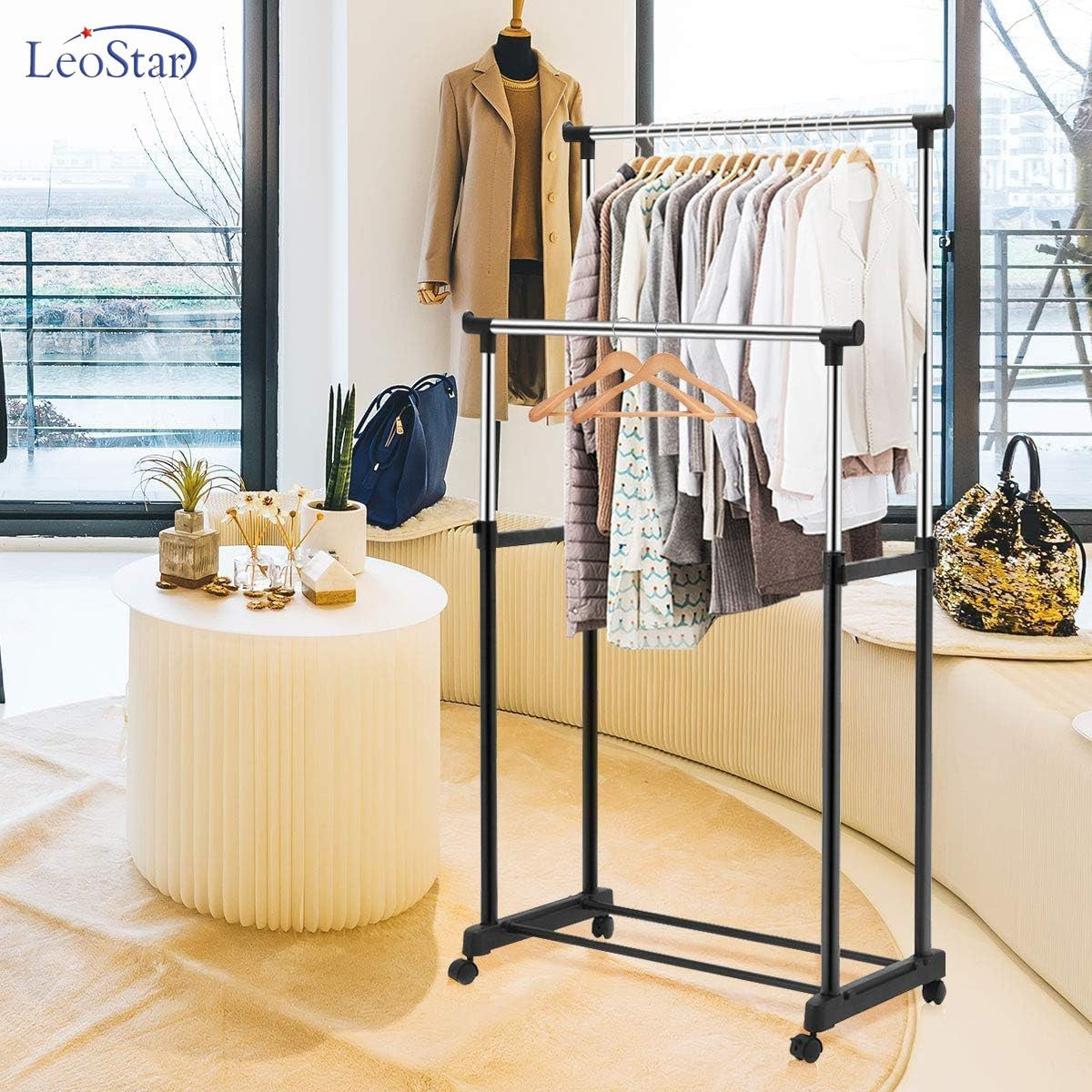 A Double Pole Portable Garment Rack Organized with Clothes.