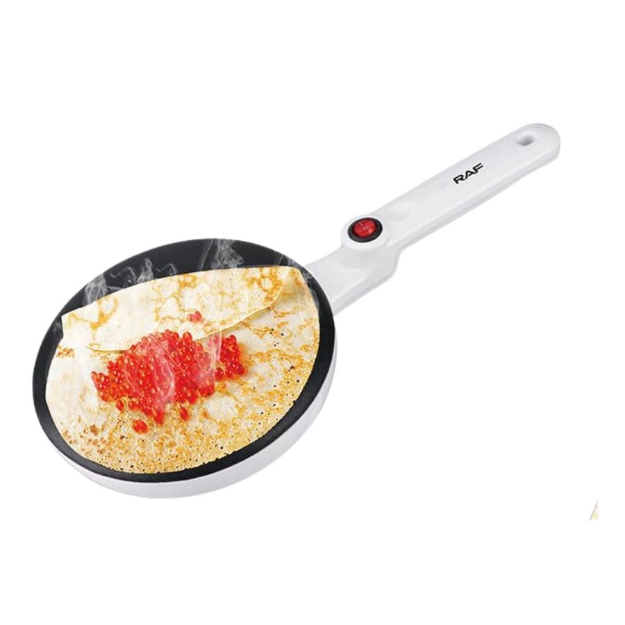 Electric Crepe Maker with Crepe in Making.